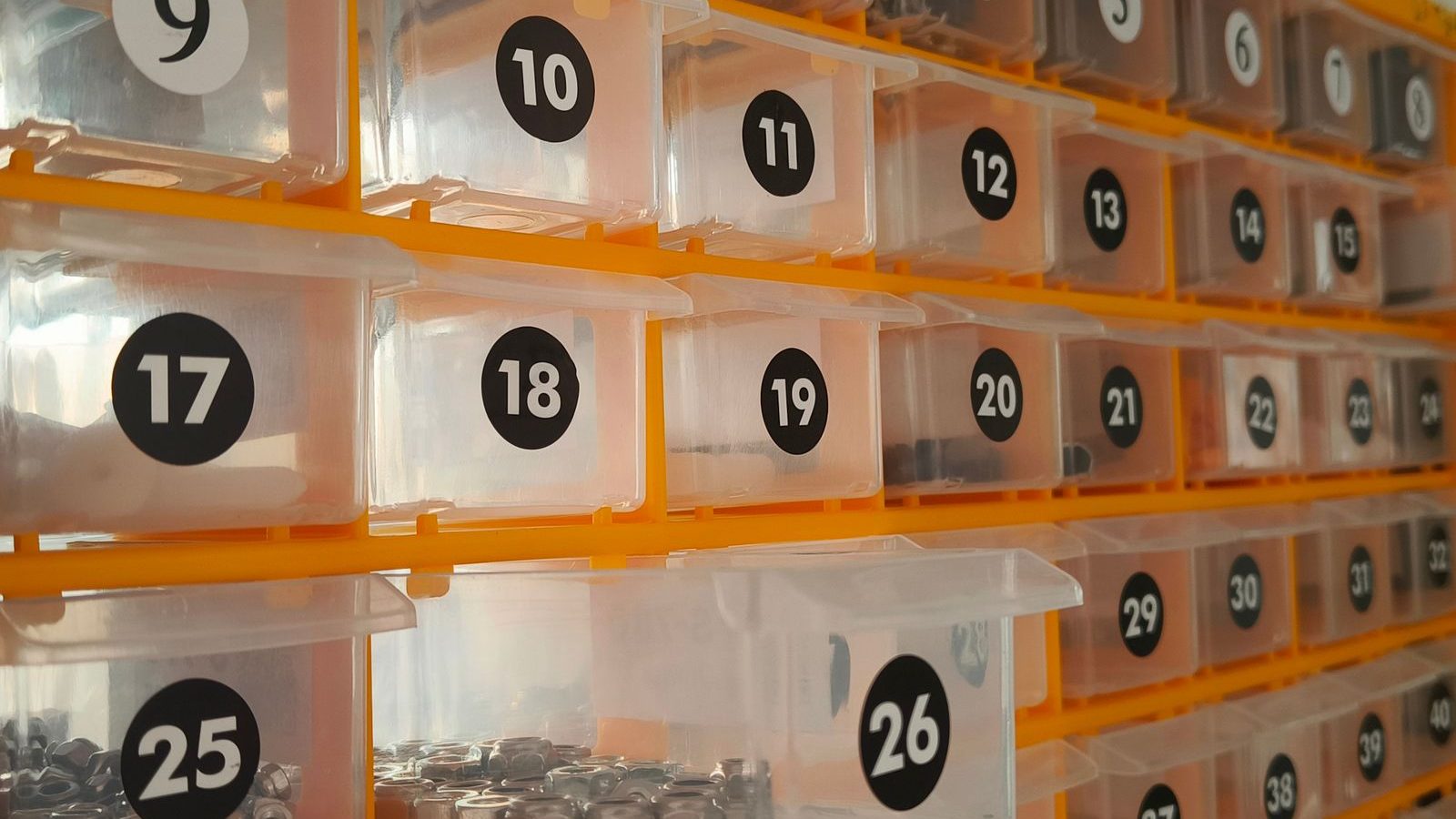 Numbered storage bins holding small hardware
