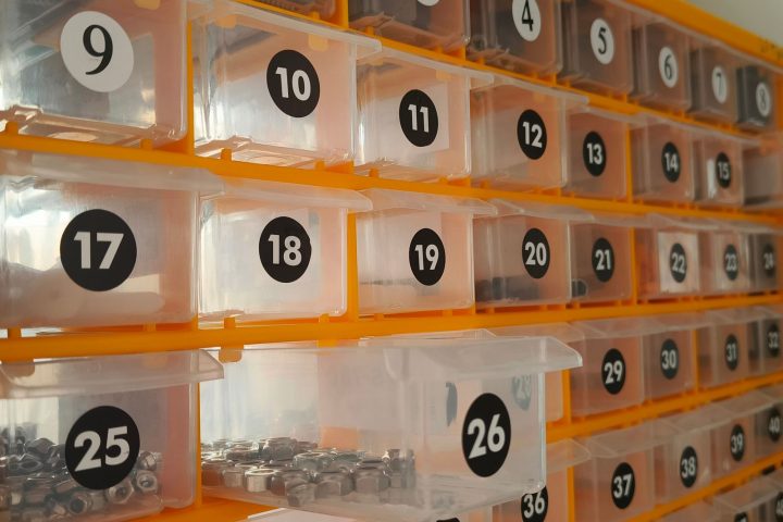 Numbered storage bins holding small hardware