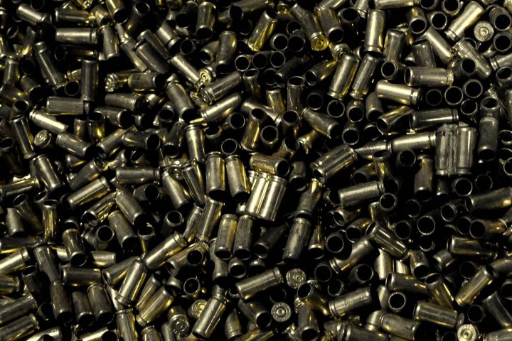 Close-up of empty brass cases with a metallic sheen