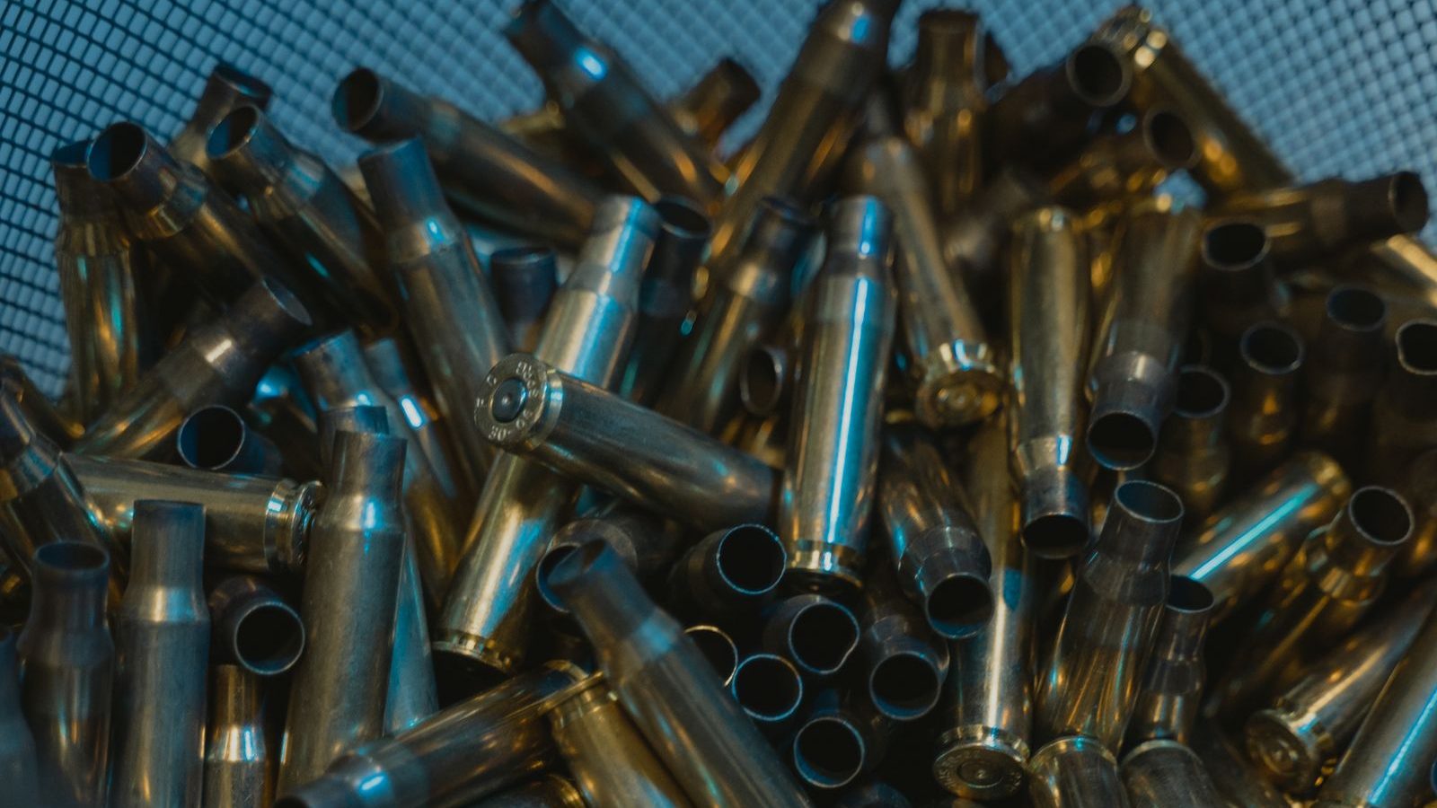 Empty brass cases collected in a mesh container
