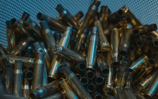 Empty brass cases collected in a mesh container