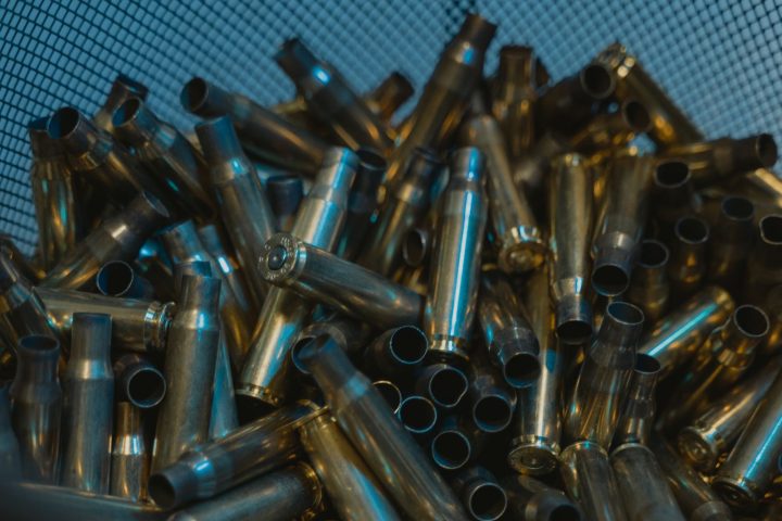 Empty brass cases collected in a mesh container