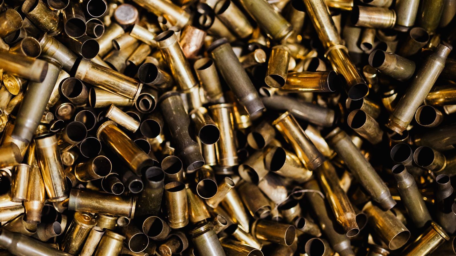 High-angle view of many empty brass cartridge cases