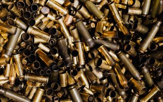 High-angle view of many empty brass cartridge cases