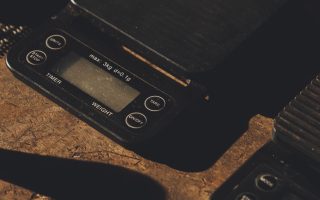 Digital scale on a rustic wooden surface