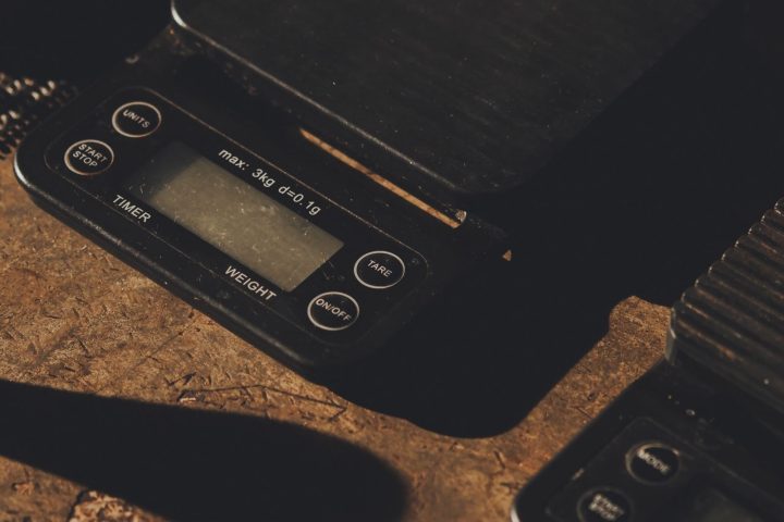Digital scale on a rustic wooden surface