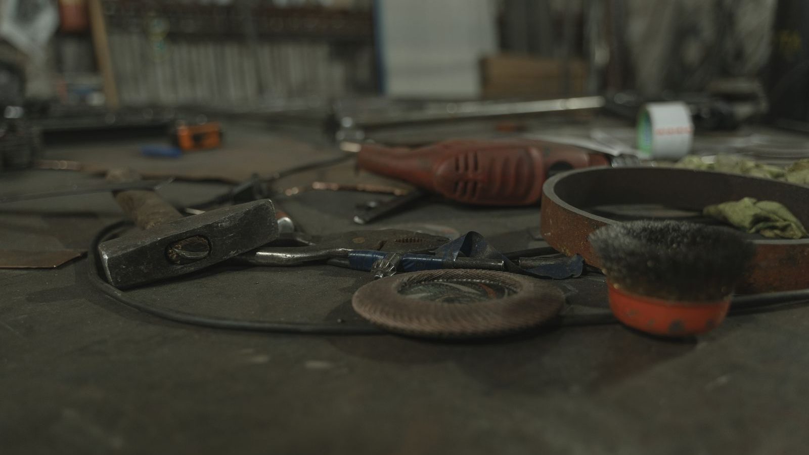 Assortment of tools laid out on a workbench