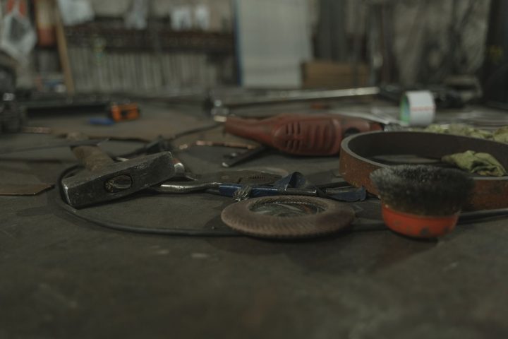 Assortment of tools laid out on a workbench