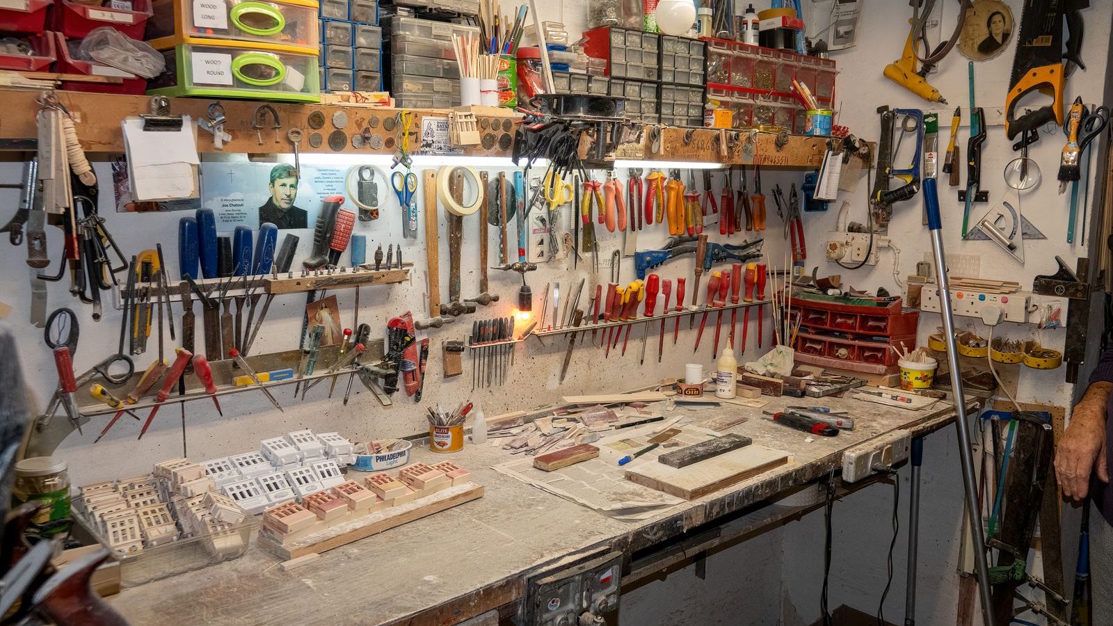 Well-organized workshop with tools and supplies on display